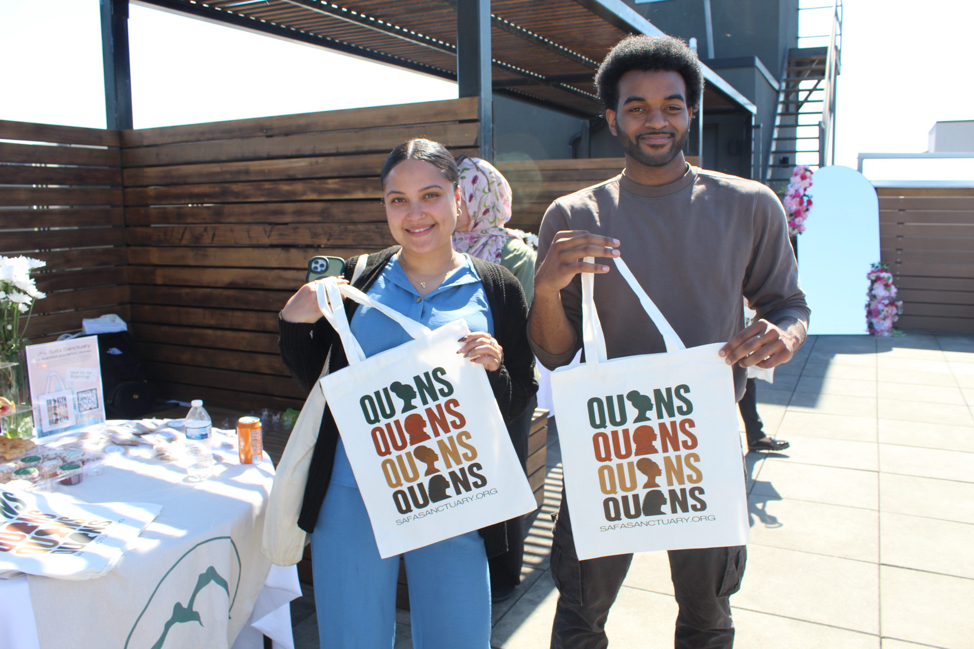 Guests holding tote bags at Safa Sanctuary's soft launch